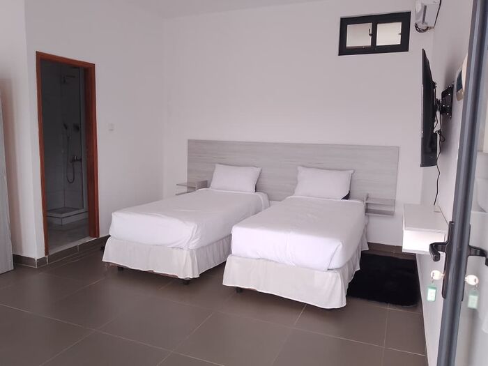 Quarto Duplo — duas camas individuais